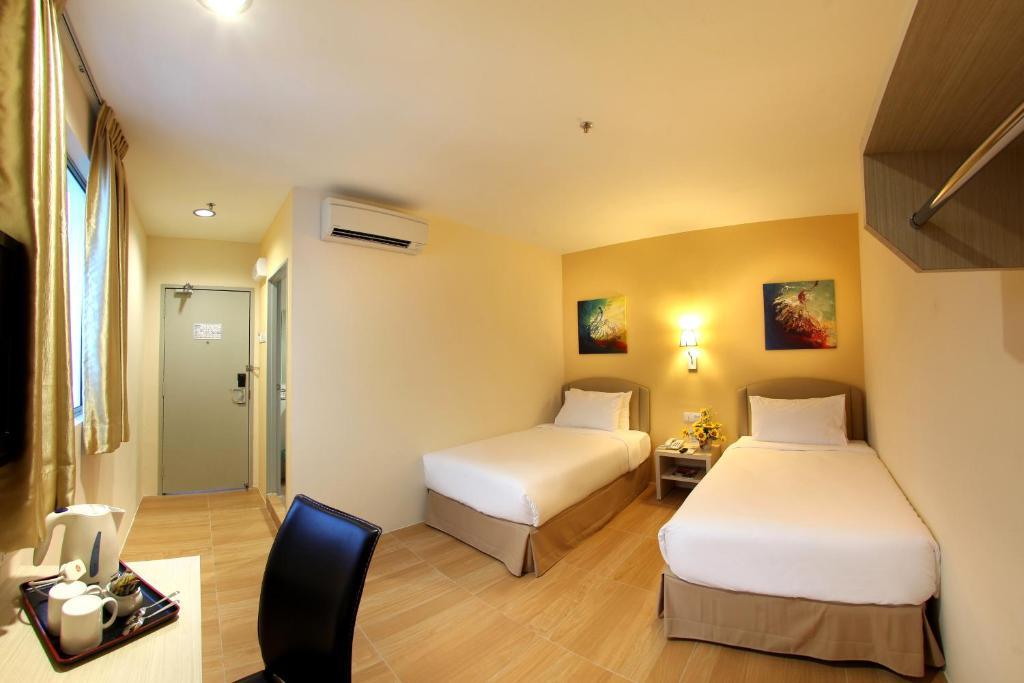 Hotel Min Cott Куала Лумпур Стая снимка
